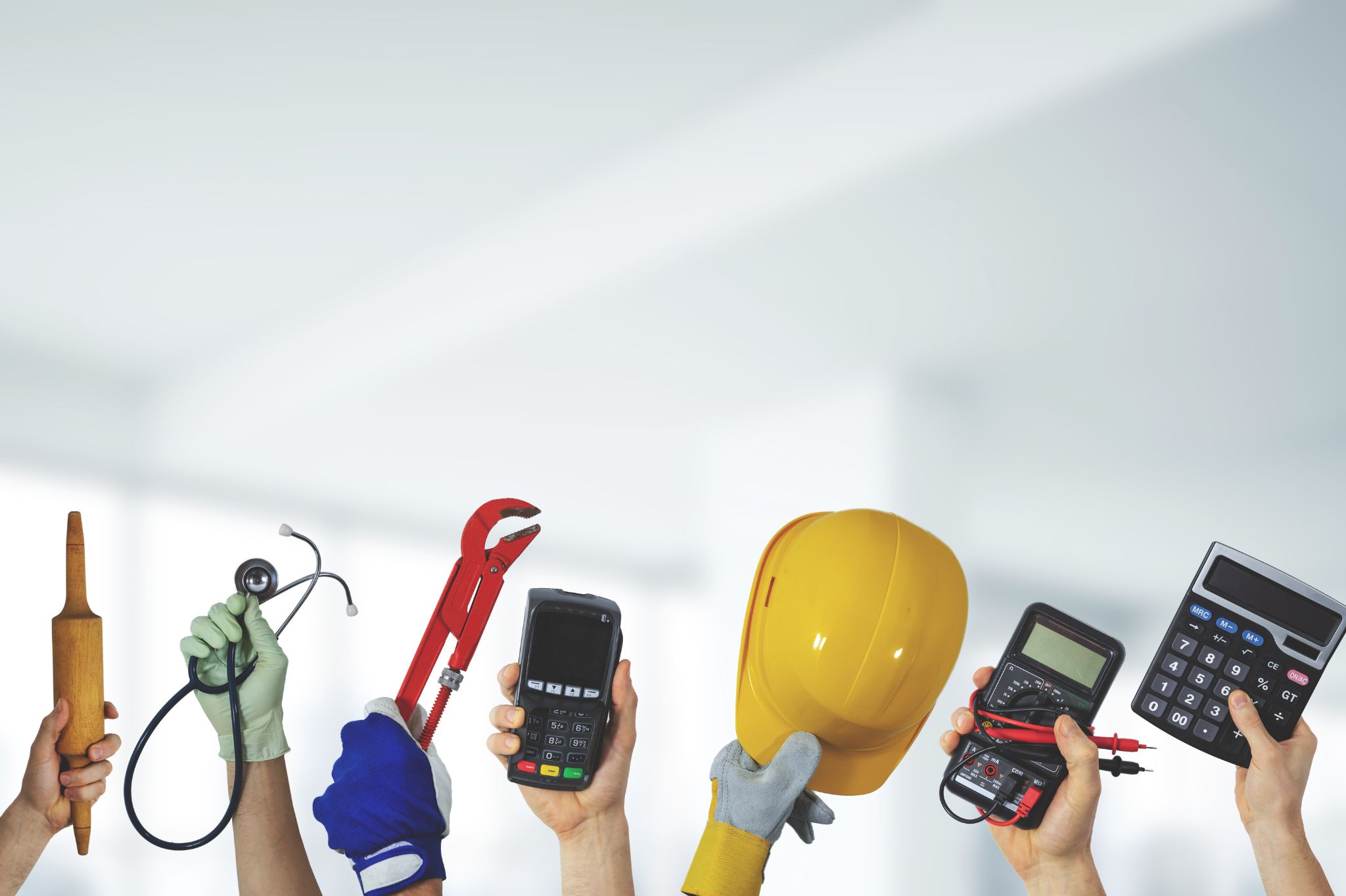 various workforce items being held up