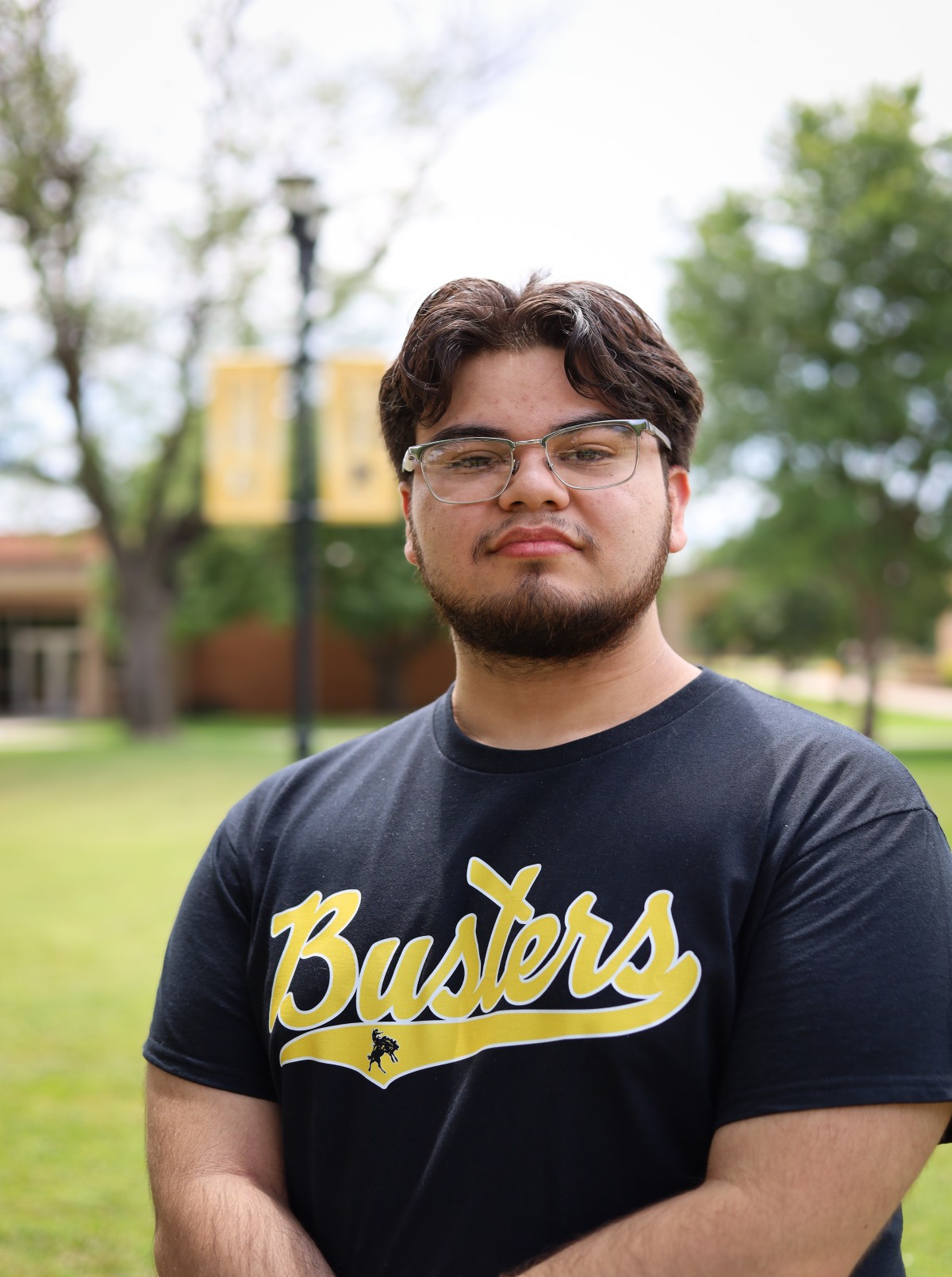 sga student in front of campus