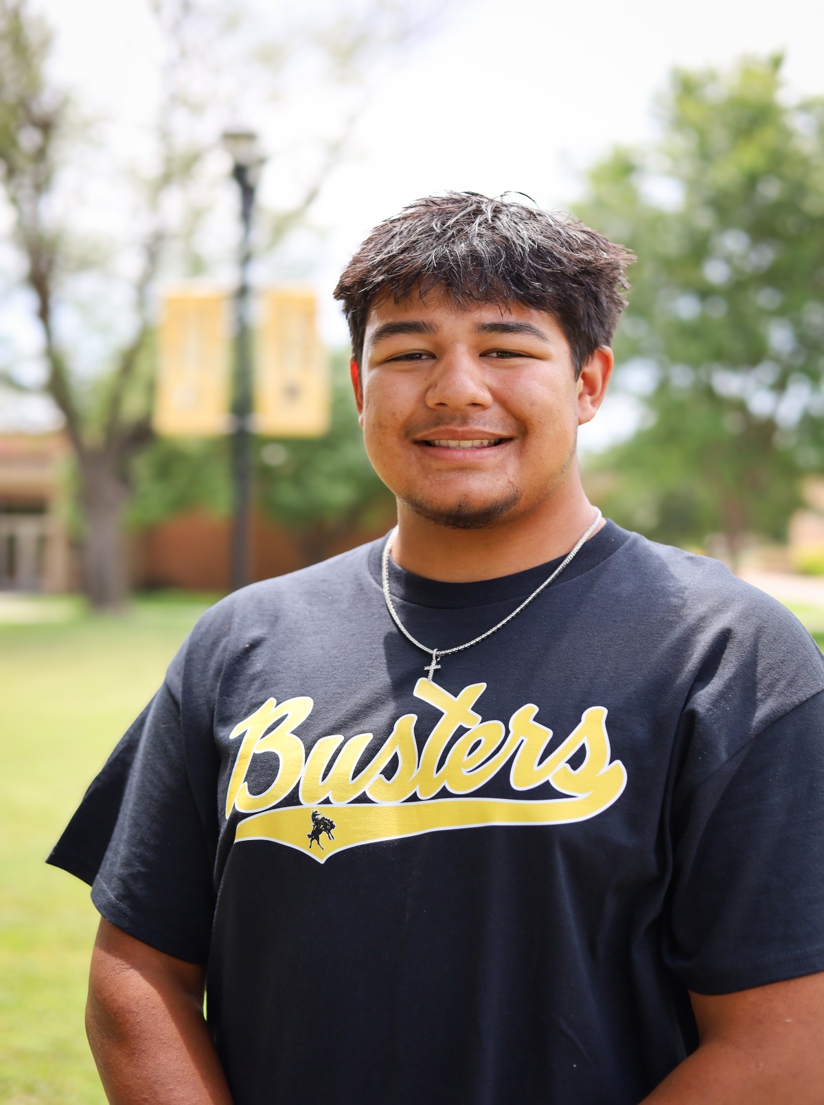 sga student in front of campus